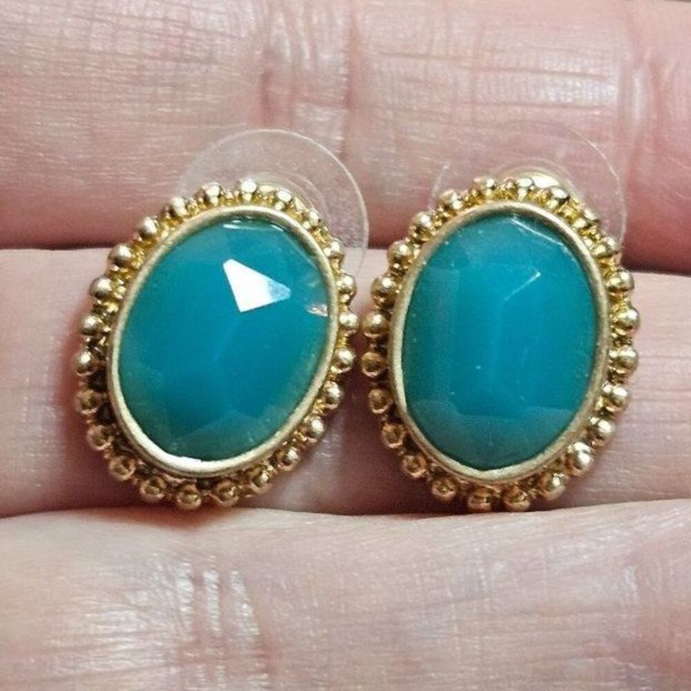 Vintage gold tone and blue faceted oval earrings